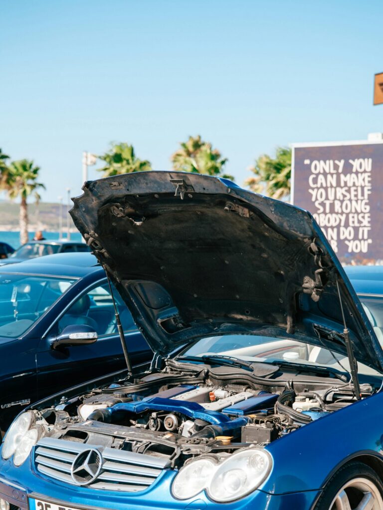 Vintage Mercedes Benz with open hood on a sunny day in Izmir, Turkey.